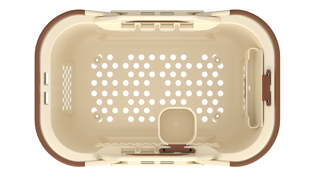 Top-down view of a shopping basket with a cream-colored interior, brown outer trim, and a matching brown latch on the right side, isolated on a white background. Inside are two accessories, a cup holder and phone holder in matching colors.